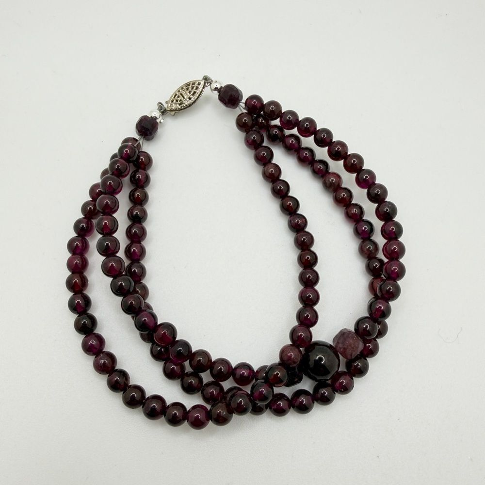 Three strands of all GARNET bracelet with vintage sterling silver‎ clasp!